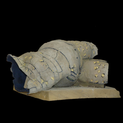 Building a hollow human figure with clay